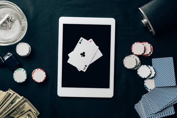Multilingual dealers at live baccarat table with chat feature visible on player interface